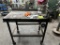 METAL WORKBENCH ON CASTERS WITH VICE