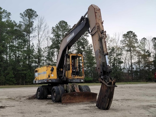 Akerman EW230B rubber tire excavator, closed cab,96'' push blade, Geith quick att Bkt, out riggers,