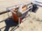 Skid steer double discharge concrete mixer