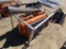 Skid steer double discharge concrete mixer