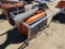 Skid steer double discharge concrete mixer