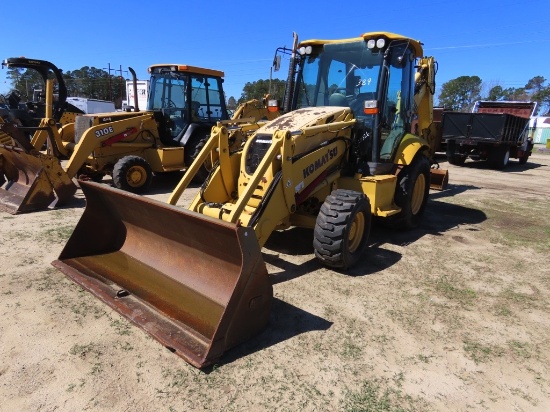 Komatsu WB 146 backhoe, closed cab, 90inch JCB loader bucket, extended hoe, 47inch WR clean-out buck