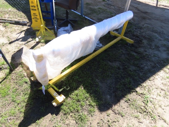 Metal frame w/wheels w/roll of plastic