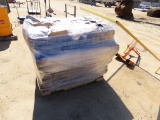 Pallet of clear plastic rolls