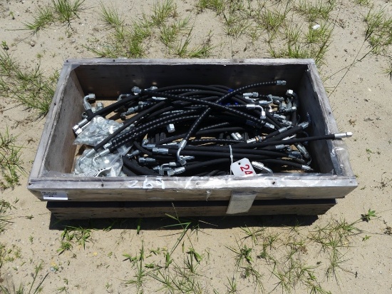Wood box w/assortment of hyd hoses