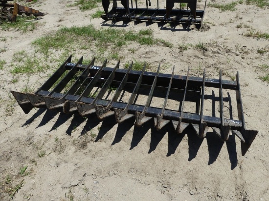 Skid steer root rake