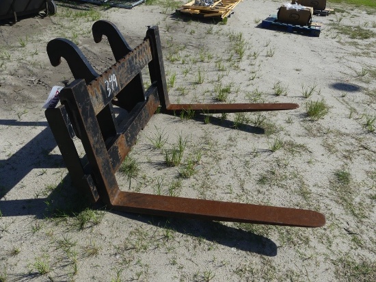 CAT rubber tire loader fork attachment