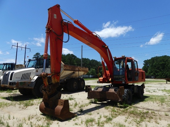 2006 JOHN DEERE 210CW wheel excavator, closed A/C cab, 4 stabilizers, 60inch Geith clean-out bucket,