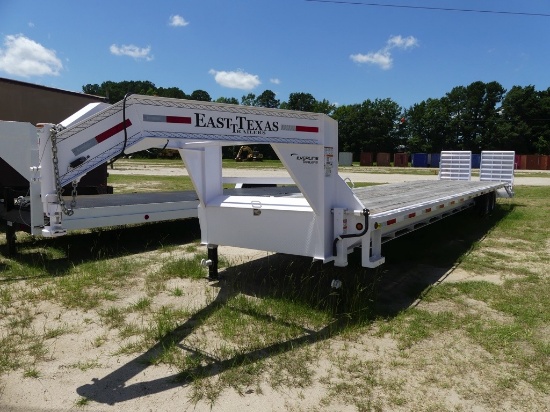East Texas T/A Gooseneck Trailer, 35ft w/5ft dovetail w/loading ramps, 96inch wide w/tie down straps
