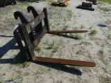 CAT rubber tire loader fork attachment
