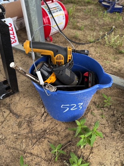 Bucket of DeWalt drills