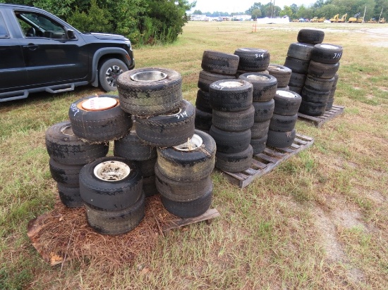 3 stacks of golf cart tires
