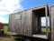 10x12 shed with roll up door and side door plus 4 ft deck area