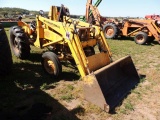 International 2404 Tractor with no. 2000 international loader, shuttle tran