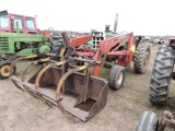 Oliver 1555 gas tractor, loader special with F235 farmhand loader and grapp