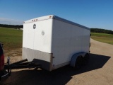2001 Wells cargo enclosed trailer, good tires, lights and plugins, cabinets
