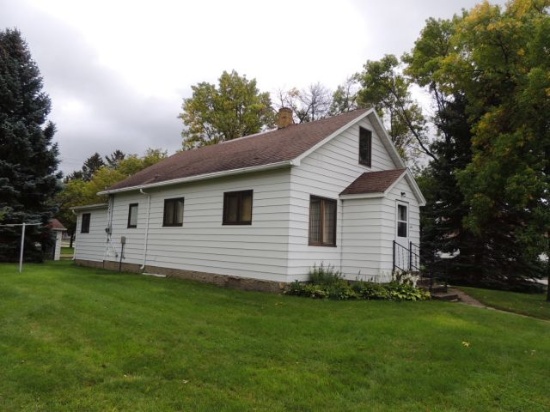 Lot 5: 424 4th ST SE.  25x36 House with a 14x15 entry addition and metal si