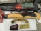 4 soft gun cases, 1 hard gun case, hunting shell belt with 12 ga. shells, p