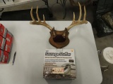 saugage stuffer and a set of deer antlers