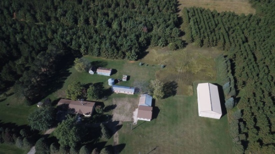 Tract 1: Homestead, outbuildings, and 5 acres of land