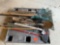 Pallet of forks, shovels, rakes, brooms