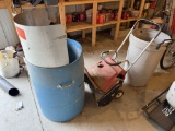 Two garbage cans and toro blower