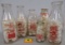 Grouping of 6 Antique Glass Milk Bottles inc. Twin Pines, Guernsey,  Indian Hill and Others.