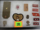 Riker Mount with WWI Japanese Insignia, Badges, Etc. These items were brought back as Souvenirs by U