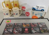 Collection of AC Spark Plug Items, Inc. Framed Race Cards, Mugs, and Ertl Panel Truck Bank