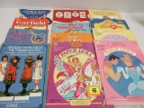 Lot (12) Vintage Paper Dolls Books She-ra, Shirley Temple, Gilda Radner+