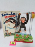 Vintage T.N. Japan Tin Battery Op Loop The Loop Monkey Toy