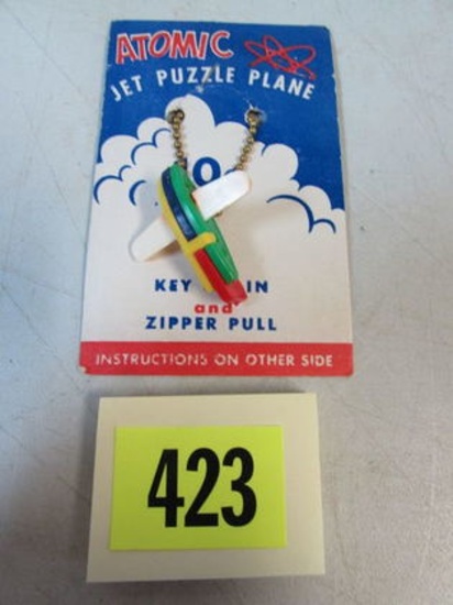Vintage 1950's Atomic Jet Airplane Puzzle Keychain