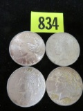 Group of (4) Peace Silver Dollars