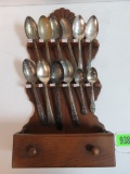 Lot of (12) World's Fair Souvenir Spoons (1892 - 1982) with Wooden Spoon Rack