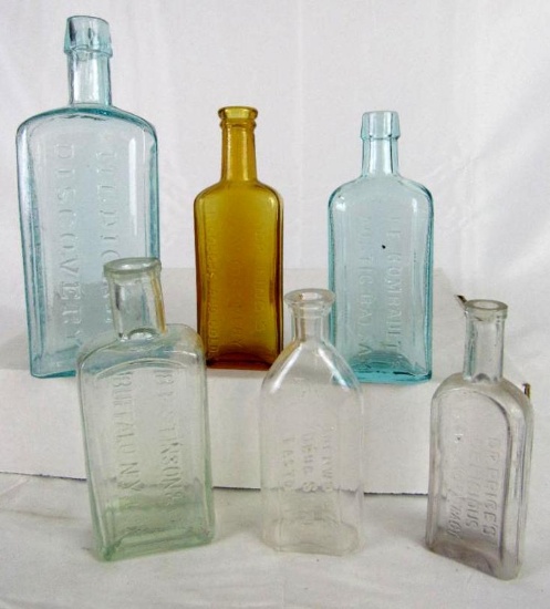 Lot (7) Antique Apothecary/ Medicine Embossed Glass Bottles