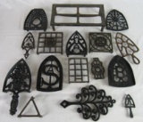 Lot of (15) Antique Cast Iron Sad Iron Trivets