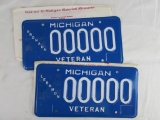 (2) Vintage 1990's Michigan Sample License Plates- Grenada & Lebanon War Veterans