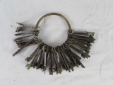 Large Brass Ring of Antique Cast Iron Skeleton Keys
