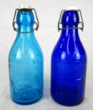 Lot (2) 1965 Thatcher's Dairy Embossed Milk Bottles (Blue)
