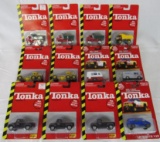 Lot (12) Tonka 1:64 Diecast Trucks MOC