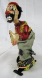 Antique TPS Japan Tin Wind-Up Clown on Rollerskates Toy