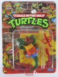 Vintage 1989 Teenage Mutant Ninja Turtles LEATHERHEAD 19-Back MOC Unpunched