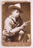 1885 Western Cowboy w/Gun Cabinet Photograph