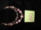(2) Pink beaded necklaces