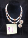 Beaded necklace and clip earrings