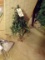 (4) Small wood pedestal Christmas trees