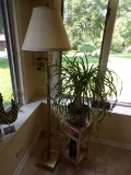 Brass floor lamp & wicker plant stand