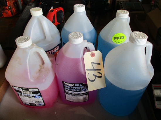 (4) Jugs windshield washer fluid & (2) Jugs RV antifreeze