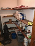 Contents of janitors closet, cleaning supplies, sweeper