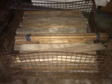 Metal cage of wooden planks